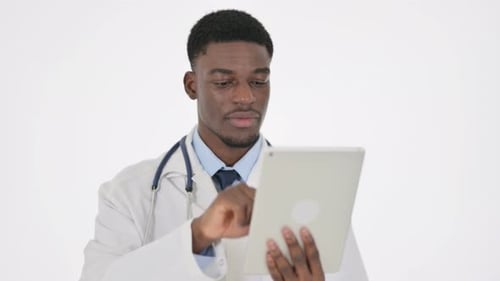 Doctor Using Tablet in Clinical Setting