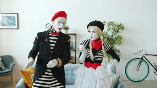 Mime Duo Performing Expressively in Living Room