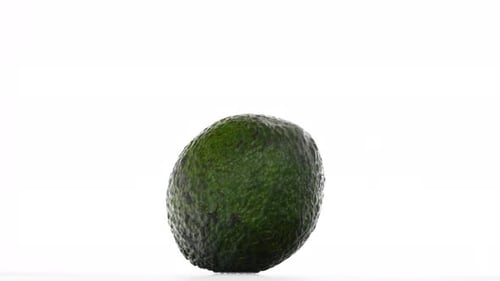 Rotating Avocado Showing Green Textured Skin