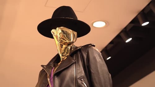 Woman Mannequin in Designer Felt Hat and Leather Jacket