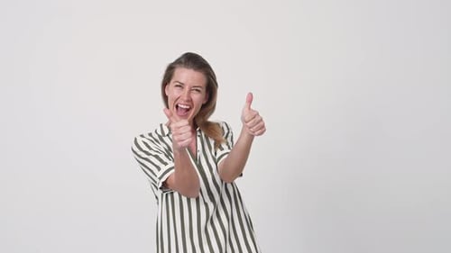 Excited Woman Giving Two Thumbs Up