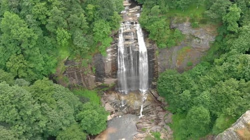 Aerial Large Waterfall in Untouched Wild Forest