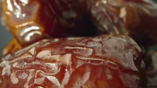 Macro of wrinkled skin on dates