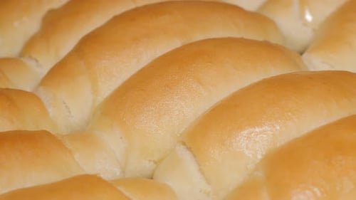 Crescent rolls home baked close-up panning 4K 2160p UHD video - Tasty dough crescent rolls close-