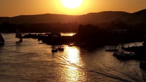 Beautiful Felucca Boats on Nile River Passing By Aswan
