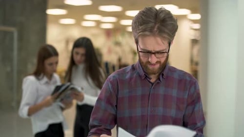 Angry Bearded Manager Throwing Up Papers, Man Is Mad Because of Work Close Up