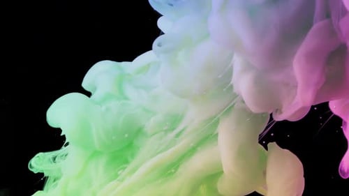 Pastel Colored Ink Clouds Flowing on Black Background