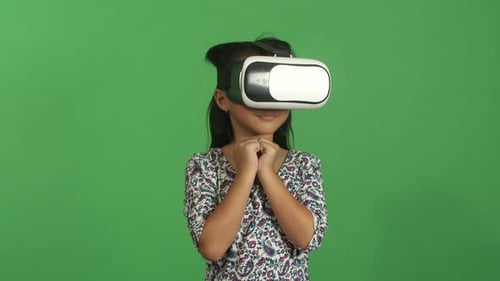 Girl Experiencing Virtual Reality With VR Headset