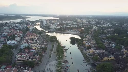 Bird Eye View Town Districts on River Banks with Boats