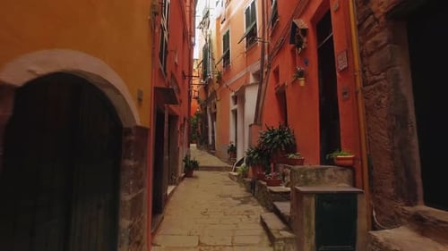 Walking Through an Ancient Narrow Street with Stone Road in Cinque Terre