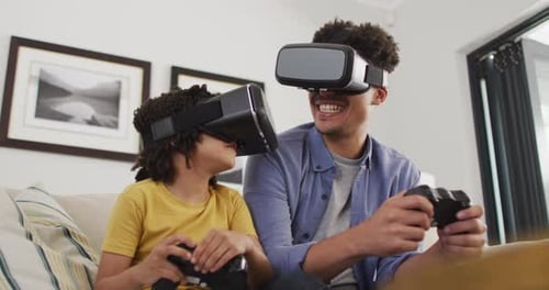 Child and Adult Playing Video Games with VR Headsets
