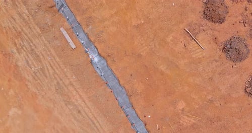Strip Foundation Reinforcement Frame for a Reinforced Concrete House Structure in Construction Site