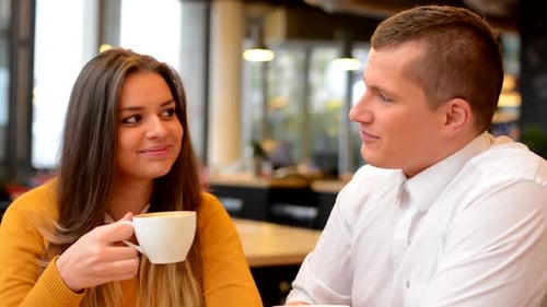 Happy Couple Drink Coffee and Smiles in Cafe, To Camera, Closeup