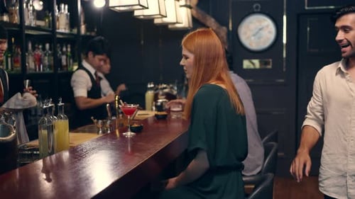 4K Group of People enjoy hangout nightlife at luxury bar.