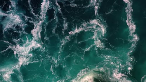 Waves of Water of the River and the Sea Meet Each Other During High Tide and Low Tide