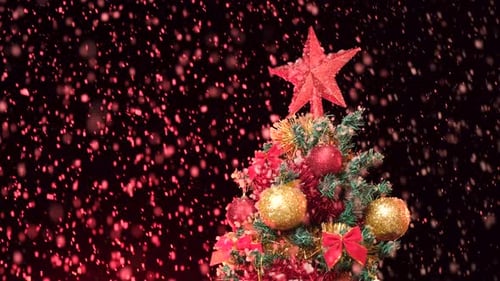 Festive Christmas Tree with Falling Snow
