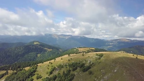 Fly Above Green Carpathian Mountains Landscape in Sunny Summer