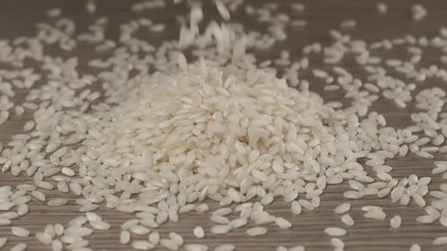 Rice Pile Close Up Filling Up