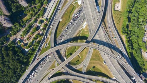 Road Junction and Cars Traffic in Summer Day. Flyover. Aerial Top-Down View