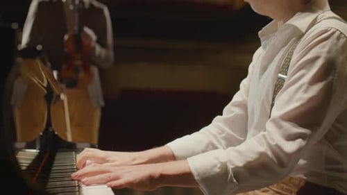 Pianist Plays During Orchestral Music Performance