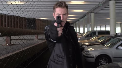 Man Pulls Gun in Dim Parking Garage