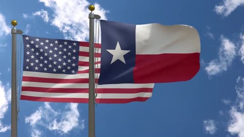 American And Texas Flags Waving Realistically In Blue Sky