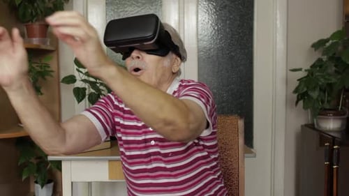 Senior Man Immersed in Virtual Reality Experience