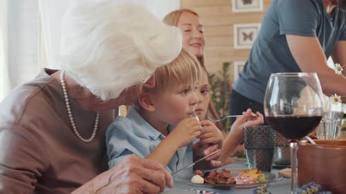 Extended Family Gathering at Home Over Meal