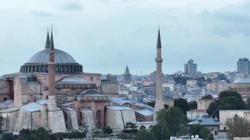Establishing Orbiting Aerial Drone Shot of a Hagia Sophia Holy Grand Mosque with Bosphorus Bridge