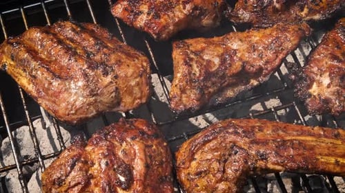 Tasty Ribs Cooking on Barbecue Grill for Summer Outdoor Party