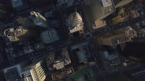 Aerial Birds Eye Overhead Top Down Panning View of High Rise Buildings in City
