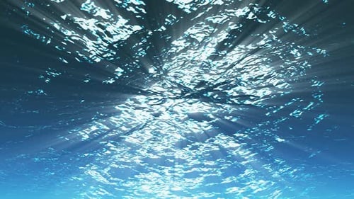Seamless Loop of Underwater Sunbeams and Shimmering Water Surface