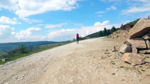 Girl Hiker At Mountain Peak