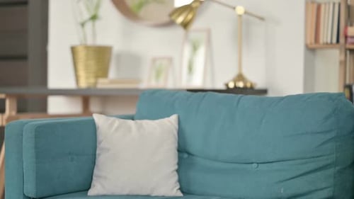 Old Man Coming and Sitting on Sofa