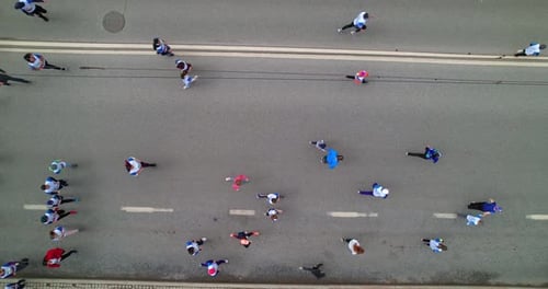 Aerial View of People Running a Marathon
