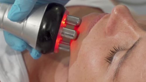 Sliding Cropped Shot of a Mature Woman Getting Facial Rf-lifting Procedure