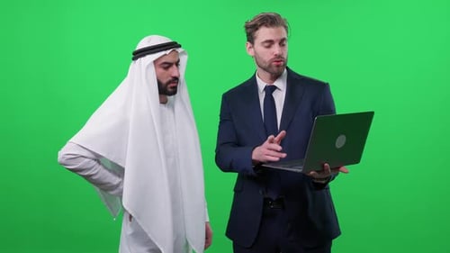 Businessmen Talking, Using Laptop on Green Screen