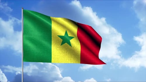 Senegal Flag Waving Proudly Against Blue Sky