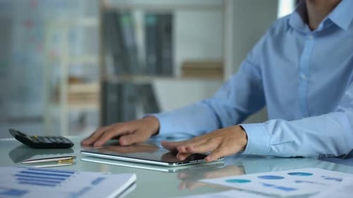 Upset Businessman Scrolling Tablet, Counting Calculator, Small Business Income