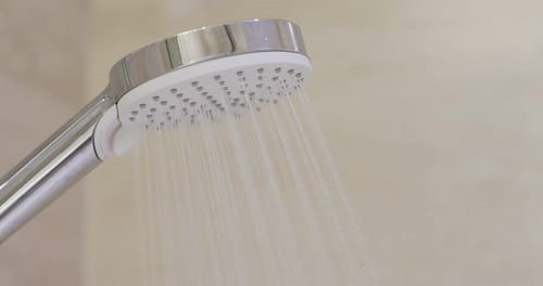 Water Flowing from a Modern Shower Head