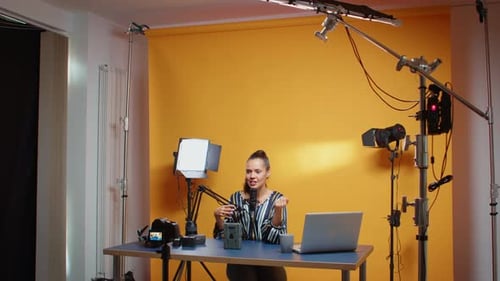 Content Creator Recording an Episode About V Mount Batteries