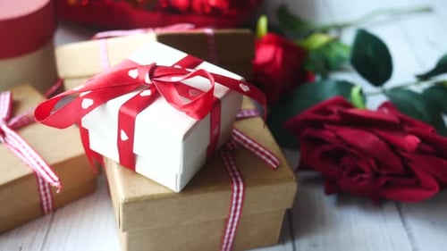 Gift Box and Red Roses Still Life Arrangement