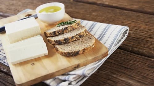 Artisan Cheese and Bread on Wooden Board