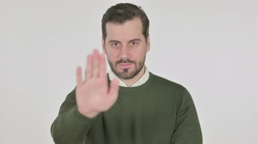 Portrait of Man Showing Stop Sign By Hand White Screen