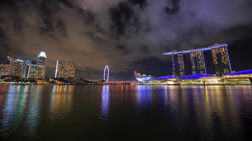 Time-lapse of marina bay at night, urban landscape at Singapore
