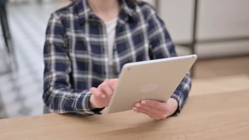 Female Hands Using Tablet Close Up