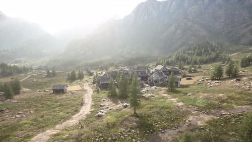 Cinematic Aerial Flight Over Ancient Mountain Village