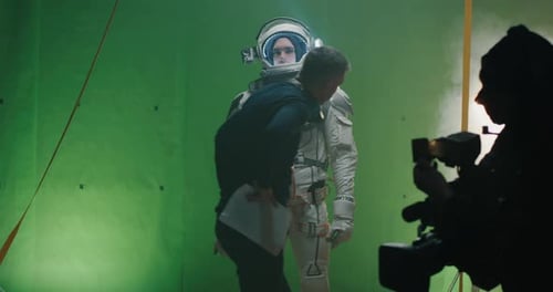 Astronaut On Set With Crew on Green Screen