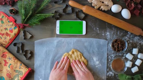 Hands Prepare Festive Holiday Cookies