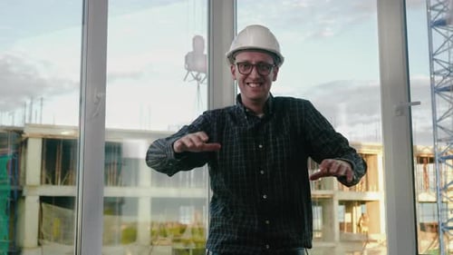 Engineer Dance. Funny Dancing in Helmet.
